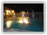 Pool fountain by night